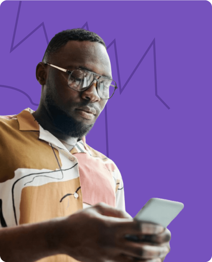 Man looking at his smartphone with a thoughtful expression